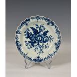 An 18th century Worcester Dr Wall period blue and white shallow bowl, with scalloped edge, floral