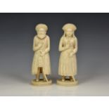 A pair of Indian carved ivory figures of a Mughal nobleman and noblewoman, late 19th century, both