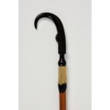 A Swiss mountain walking cane, the handle in Chamois horn with carved hoof, the malacca shaft