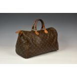 A Louis Vuitton Chantilly monogram "Speedy" small holdall bag, with tan leather handles and trim,