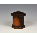 A Victorian lignum vitae string box, of cylindrical form with screw fitting domed lid, 5 3/8in. (