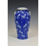 A Japanese porcelain blue and white vase, late 19th century, tall ovoid form with twin ring handles,