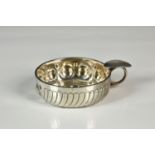 A French silver tastevin, probably early 20th century, hallmarked to thumbpiece ring, gadrooned