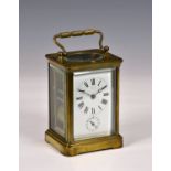 A French gilt brass repeating carriage clock with alarm, the twin train movement striking the