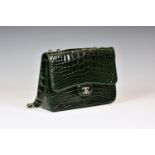 Chanel - a dark green alligator Jumbo flap bag, c. 2010, with single outside pocket, silver hardware