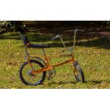 A Raleigh Chopper MK.I vintage bicycle, 1970, frame No. 1506452, in 'Brilliant Orange' with black