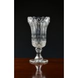 A Victorian cut glass celery vase, the tulip form bowl with diamond, panel and teardrop cut