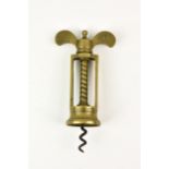 A 19th century brass Farrow & Jackson corkscrew, heavy brass twin pillar mechanical corkscrew,