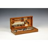 A 19th century mahogany cased field surgeons kit by John Bell & Croyden, the instruments stamped