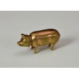 A very rare and unusual antique novelty pig figural lipstick holder, the shaft sliding out to reveal