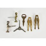A collection of novelty erotic and naughty corkscrews, bottle opener and nut crackers, comprising an