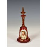 A 19th century Bohemian overlaid and flash cut ruby glass portrait scent bottle, of hand bell