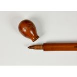 A Victorian pencil stick gadget walking cane, the turned knob detaching to reveal a pencil on a