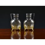 A pair of Victorian etched glass water flasks, the spherical bodies etched with fish amidst water