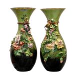 A pair of monumental French majolica Barbotine vases, 19th century, baluster form, each decorated