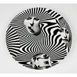 Fornasetti - a Modernist porcelain plate, limited edition no. 312, the white plate featuring a