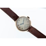 A 1920s gentleman's Rolex 9ct gold manual wind wrist watch, inside case back numbered 3942A,