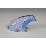 A Herend porcelain Badger, hand painted in Vieux Herend (VHB) blue fish scale design, with blue,