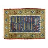 A Kilim rug with feather design on blue and khaki ground, in red, ivory, yellow, blue and khaki,