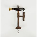 A 19th century Lund twin-pillar corkscrew, the hardwood handle complete with suspension ring and