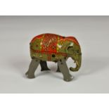 A Moko England 1948 Tinplate clockwork 'Jumbo' Walking Elephant, colourful lithographed detailing,