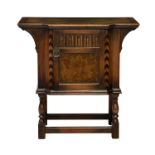 A 20th century stained beechwood breakfront console table by Kittinger, the faux marquetry painted