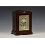 A German mahogany three train quarter striking mantel clock, early 20th century, with Junghans