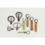A collection of Bow and Clough corkscrews, the Bows corkscrew comprising a classic two tool bow