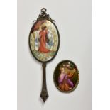 A hand painted porcelain hand mirror, depicting a full length classical female, enriched with gilt