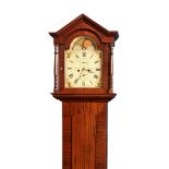 An early 19th century Channel Islands mahogany longcase clock, the eight day, bell strike movement