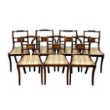 A set of seven late-Regency style mahogany and brass dining chairs, mid-20th century, including