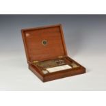 A late 19th century artist's paint box by Reeves & Sons Ltd., containing paint blocks, brushes and