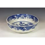 A Mason's Ironstone blue & white willow pattern wash bowl, of large shaped circular form, transfer