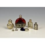 An Edwardian silver scent bottle case, M. Bros, Birm. 1901, the hinged two-part body of flask form