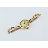 A vintage 9ct gold Omega ladies manual watch, with adjustable bracelet strap.