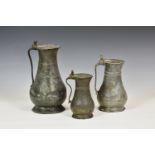 A matched graduated set of three 18th century Guernsey pewter measures, comprising a pot size