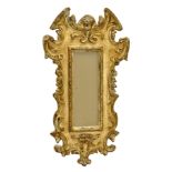 A pair of 18th century style Italian giltwood and painted mirrors, 20th century, the rectangular