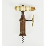 A 19th century Thomason type rack and pinon corkscrew, ring turned barrel with patent tablet with