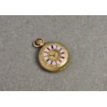 An 18ct gold half hunter fob watch, with fob wind gilt metal lever movement, floral chased gilt