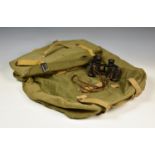 A pair of original WWII German 6x30 binoculars and Officer's uniform kit bag, the binoculars stamped