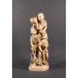 A Japanese carved ivory okimono of three fishermen, Meiji period (1868-1912), one with a basket of