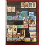 STAMPS AUSTRALIA : red stock book with mainly used from 2/- Roo to more modern material.