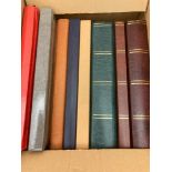 STAMPS: Two boxes of stock books of mainly used stamps much duplication,