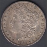 COINS : 1884 US $1 in reasonable condition, always a sought after classic Silver Coin 26.