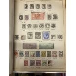 STAMPS : Large old World album with printed pages plus additional pages added.