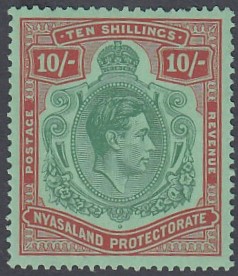 STAMPS NYASALAND 1938-44 GVI 10/- emerald & dp red on pale green, M/M with hinge remains, SG 142.