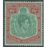 STAMPS NYASALAND 1938-44 GVI 10/- emerald & dp red on pale green, M/M with hinge remains, SG 142.