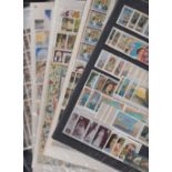 STAMPS : COOK ISLANDS, seven stock pages with various QEII U/M sets, singles, miniature sheets etc.