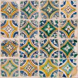 A PANEL OF SIXTEEN TILES, TUNISIA, 18TH CENTURY