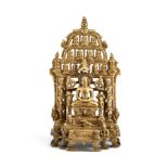 AN EARLY JAIN BRONZE SHRINE DEPICTING RISHABANATHA, WESTERN INDIA, CIRCA 13TH / 14TH CENTURY